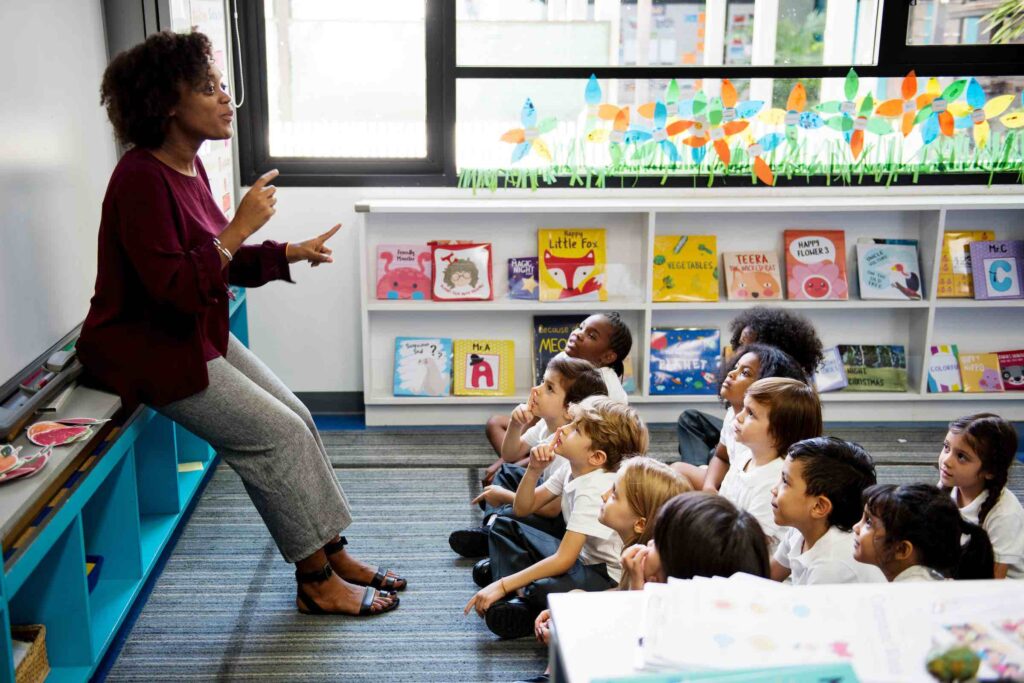 Teacher leading kindergarten class