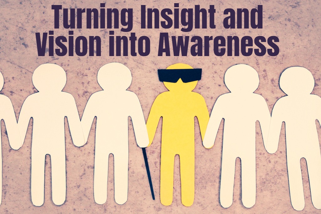 a row of people shaped paper cut outs holding hands in a line, one has dark sunglasses and a white cane. Above the figures text reads "Turning insight and vision into awareness"