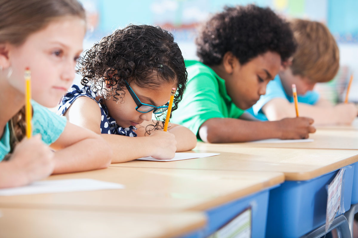 Children taking test at school