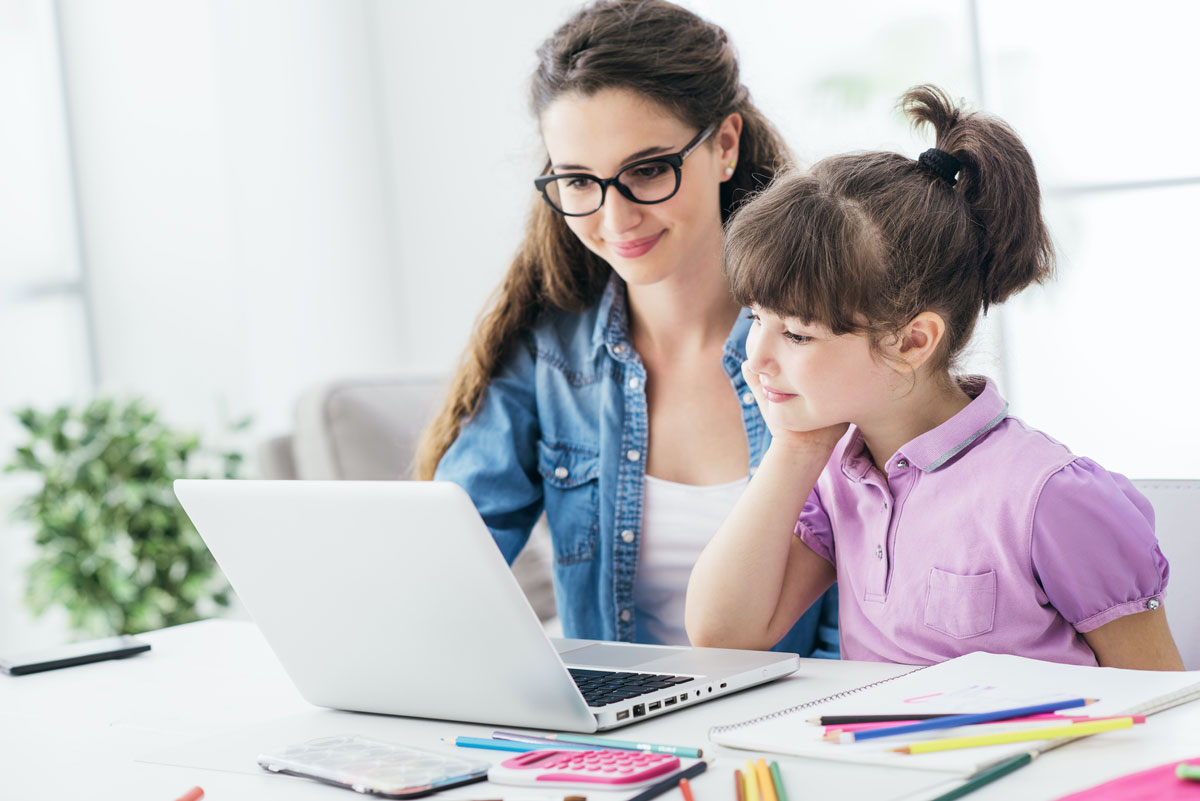 Mother and daughter on laptop