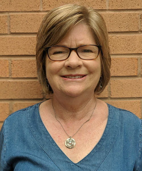 headshot of Karen Laughlin