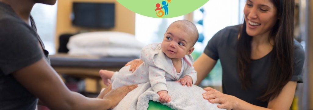 image of an infant on exercise ball with an OT and parent nearby