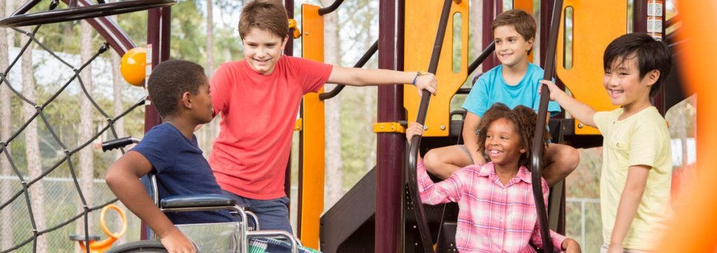 Children smiling at playground