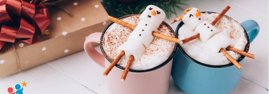 image of marshmallow snowmen floating in hot cocoa