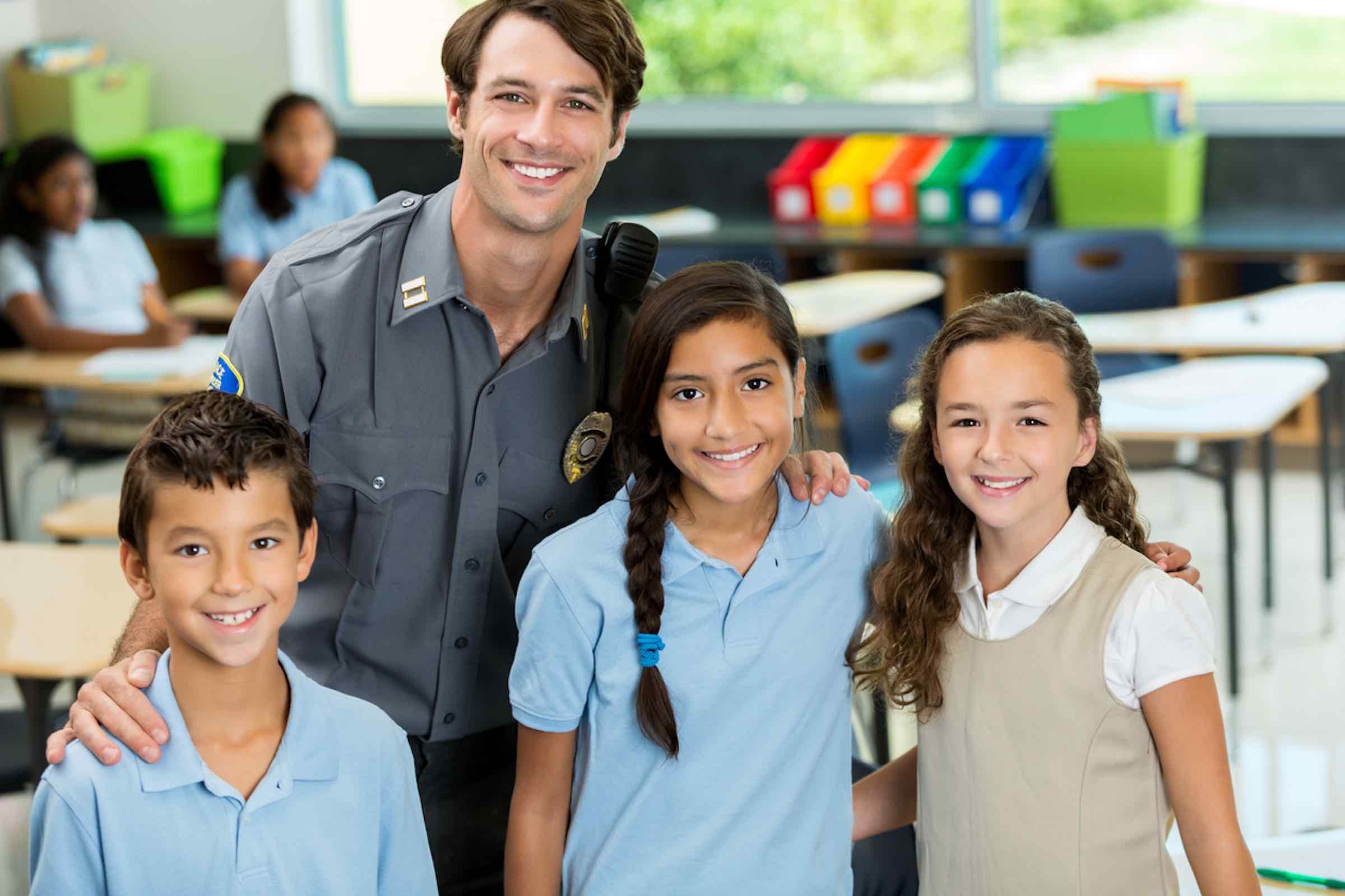 police officer with students