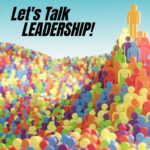 image of colorful abstract people that lead up to a summit